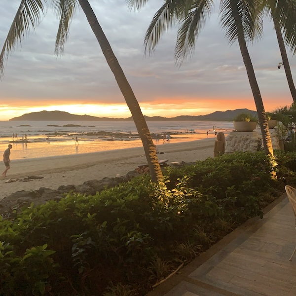 View of the beachfront from the hotel Diria at sunset in Tamarindo Costa Rica